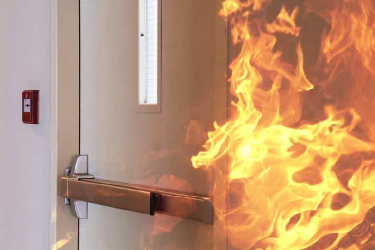Fire approaching fire door